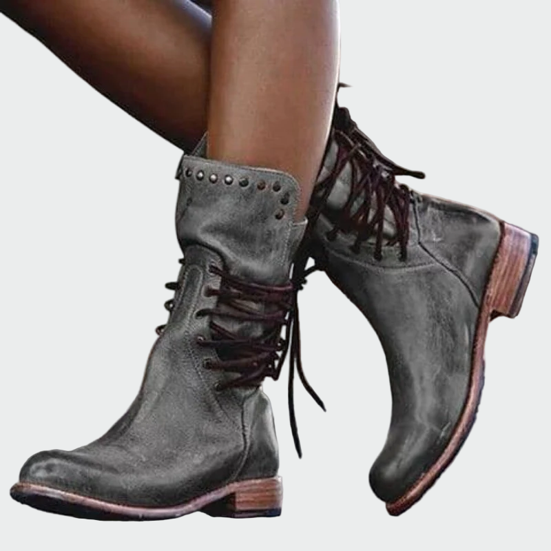 Botins de pele com atacadores feminino
