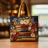 Bolsa artesanal - Estampado floral e livros
