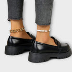 Mocassim para mulher com design ortopédico e cunha de cetim