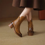 Botas em pele feminino