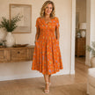 Lívia | Vestido Midi Floral com Decote Cruzado