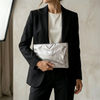 Naevia | Clutch Metalizada Elegante