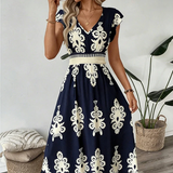 Candida - Vestido maxi barroco com decote em V